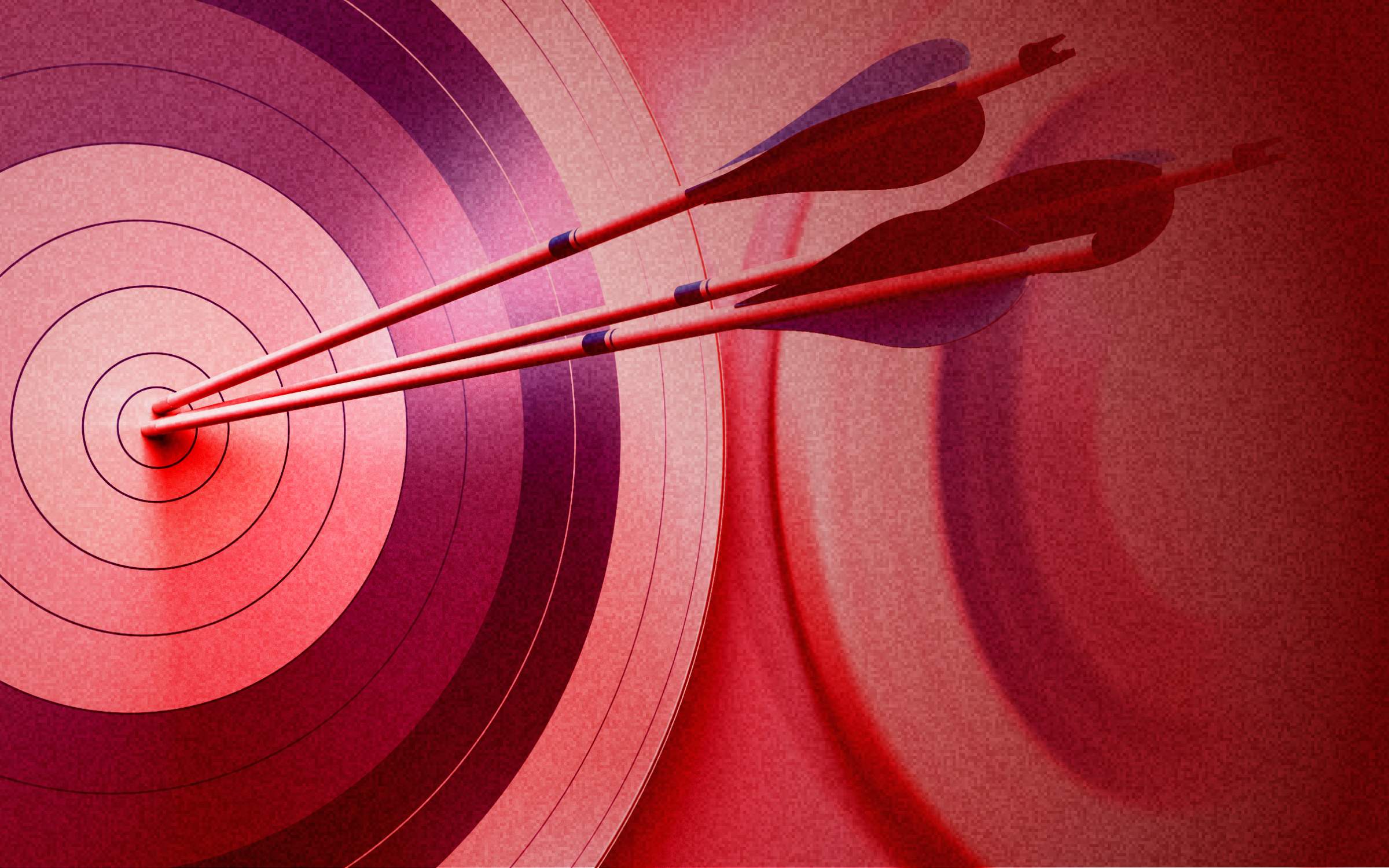 Three red arrows strike the center of a target, symbolizing precision, focus and improved performance in B2B marketing strategy and pipeline generation.