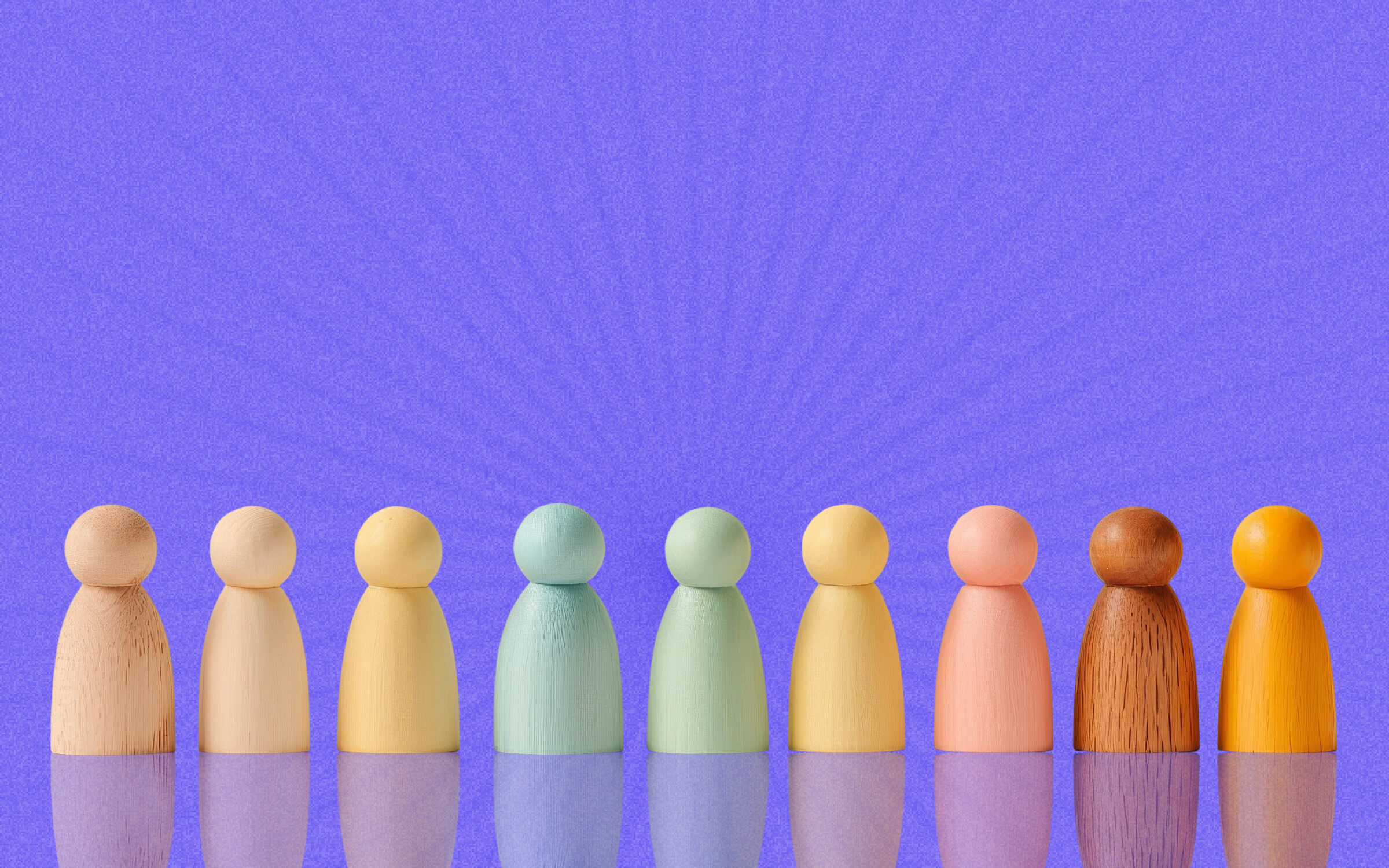 A diverse group of people standing together, symbolizing inclusivity and unity in the workplace.