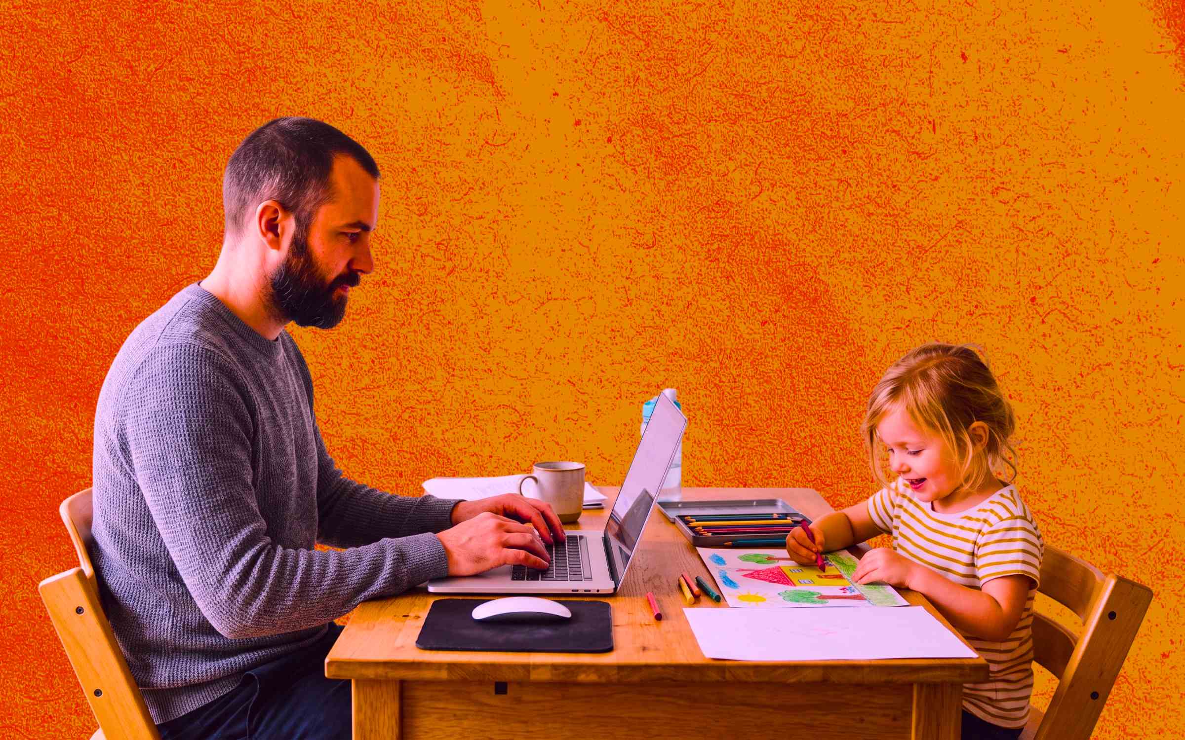 An adult works on a laptop while a child draws with colored pencils at the same table, symbolizing reliable childcare services that support working parents by balancing professional responsibilities with nurturing creativity and family wellbeing.